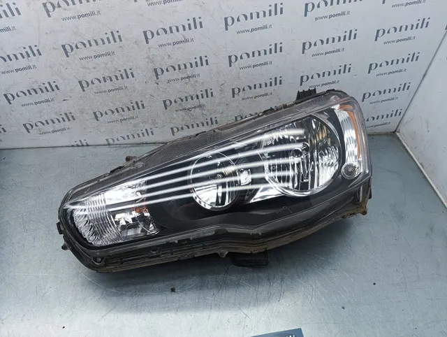 Pomili Fanaleria Lancer X faro anteriore sinistro EBM921-03 usato