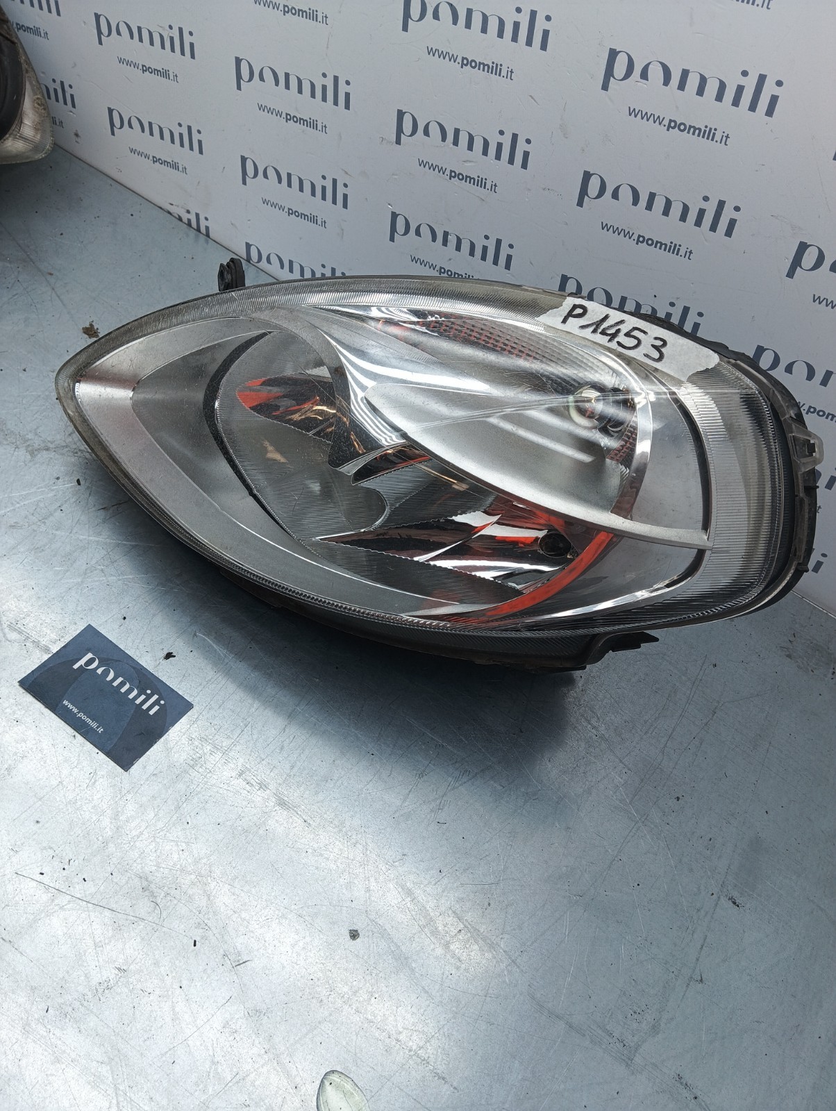 Pomili Fanaleria Lancia Y (1996-03) 153873-01 faro sinistro usato