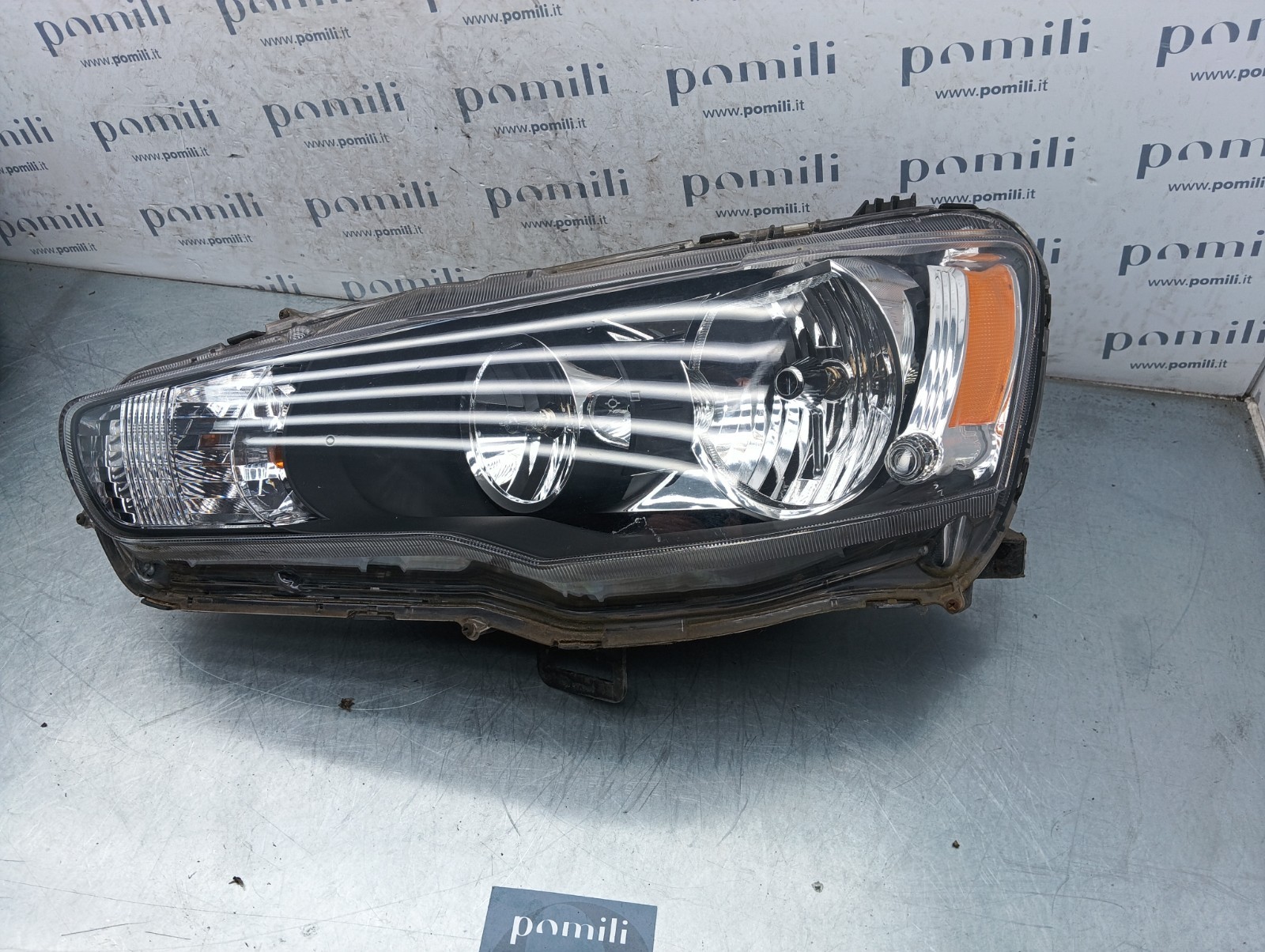 Pomili Fanaleria Lancer X faro anteriore sinistro EBM921-03 usato