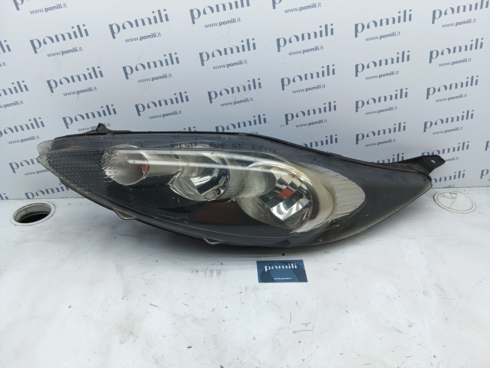 Pomili Fanaleria Ford Fiesta 2008-13 faro anteriore sinistro usato OEM