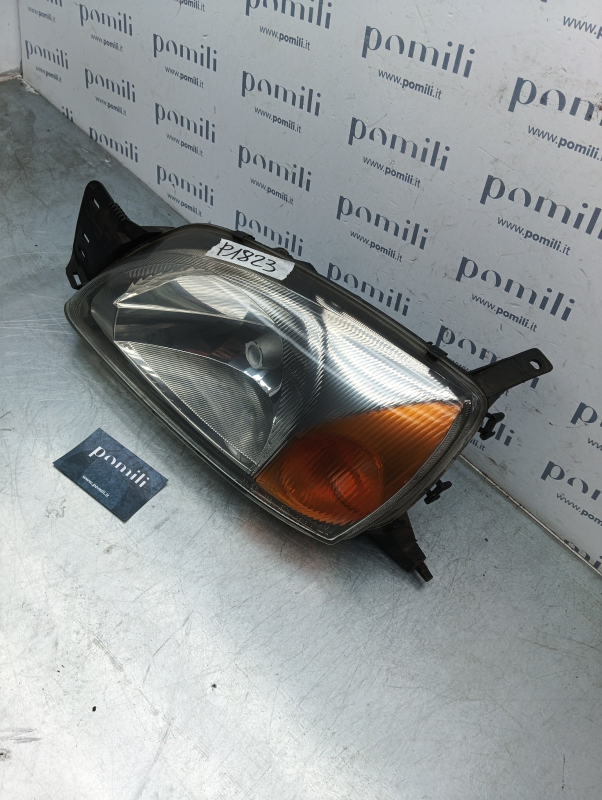 Pomili Fanaleria Ford Fiesta IV faro anteriore sinistro 1305235478 usato