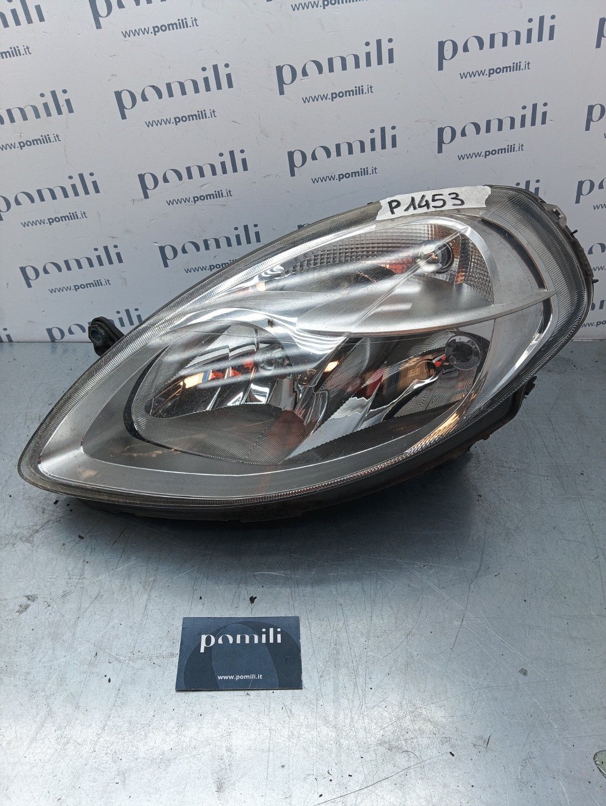 Pomili Fanaleria Lancia Y (1996-03) 153873-01 faro sinistro usato