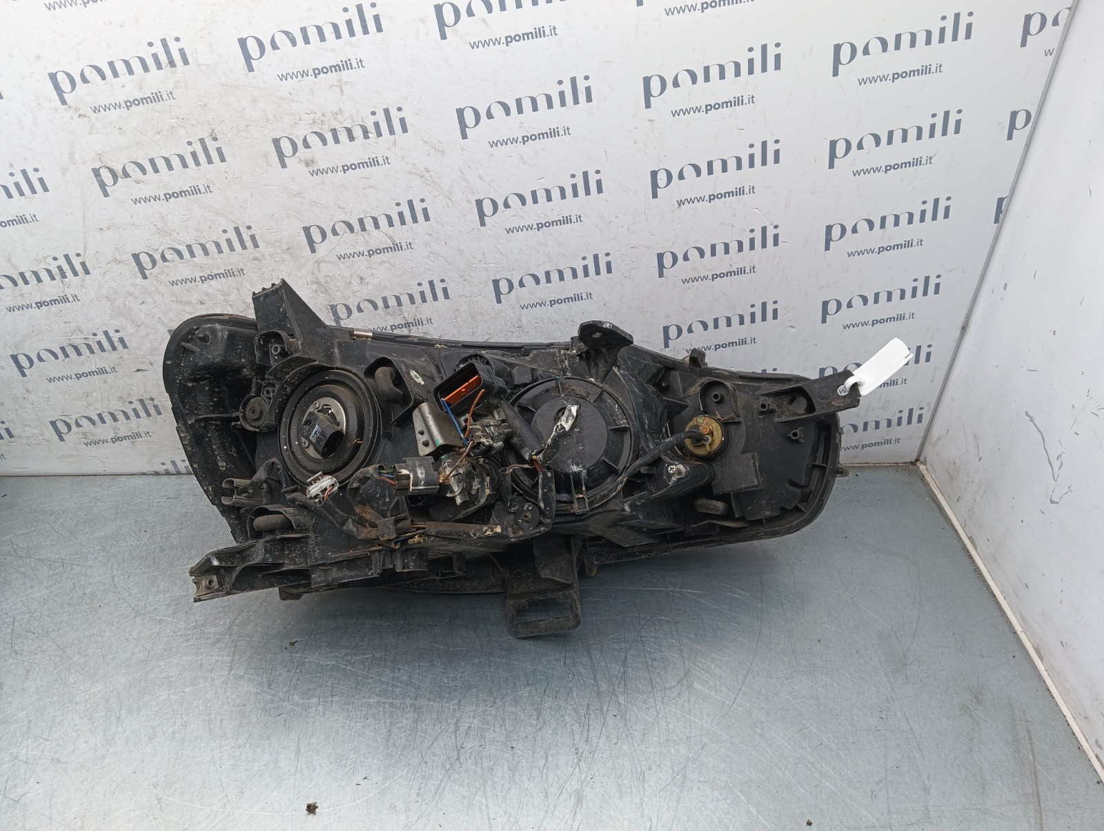 Pomili Fanaleria Lancer X faro anteriore sinistro EBM921-03 usato