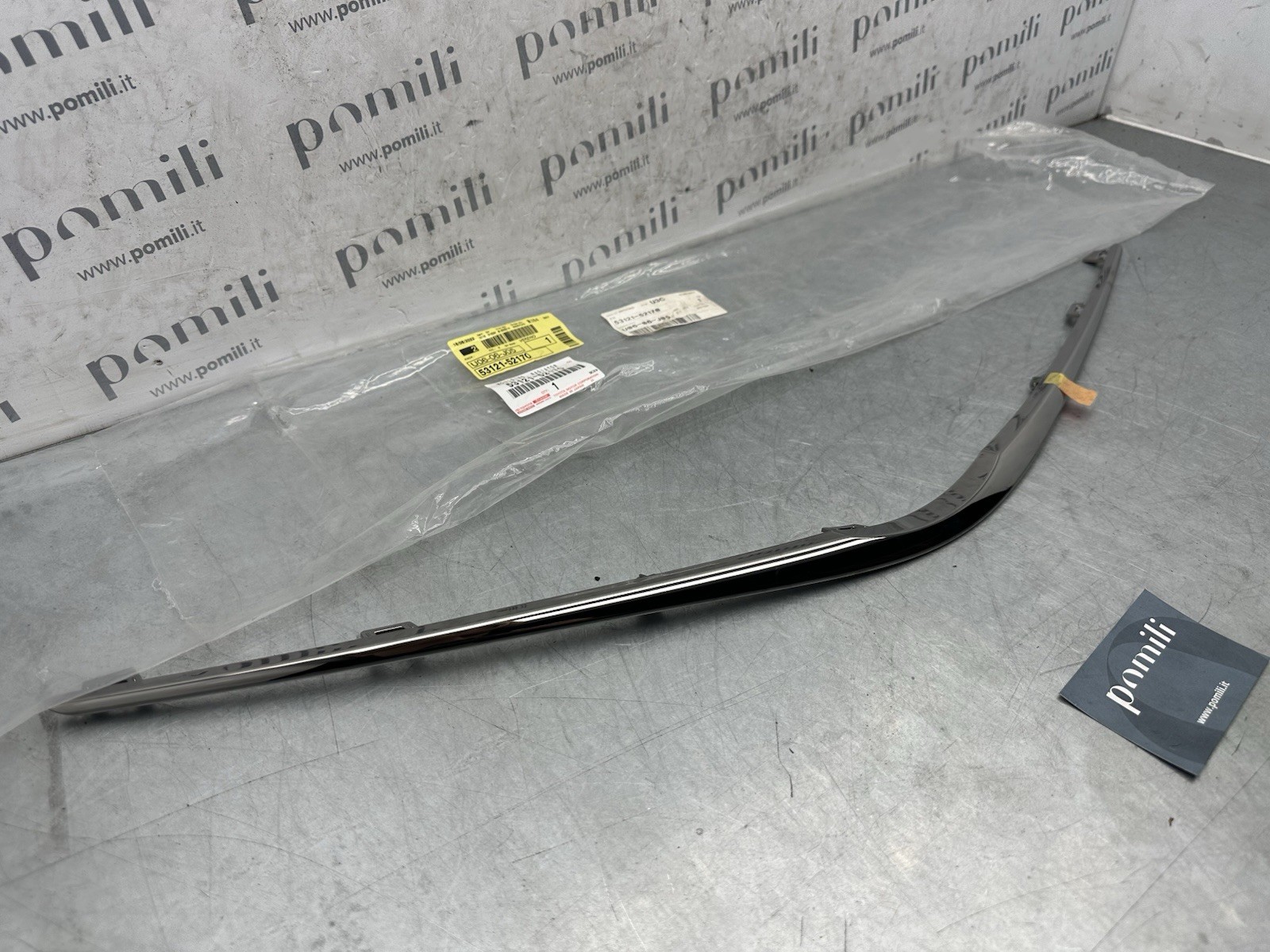Pomili Lamierati esterni Toyota Yaris 53121-52170 modanatura griglia nuova