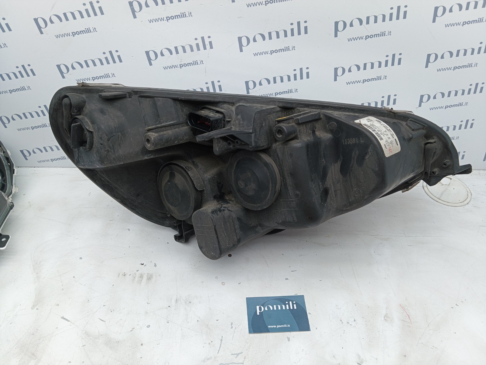 Pomili Fanaleria 6M21-13W030-AH faro anteriore sinistro usato