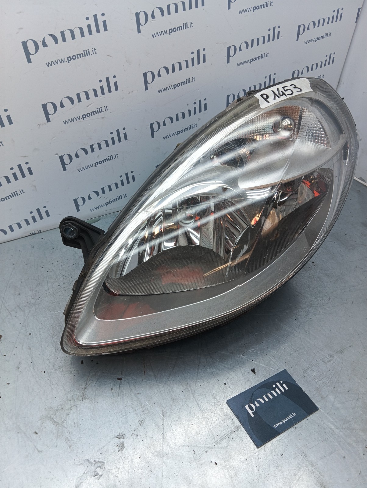 Pomili Fanaleria Lancia Y (1996-03) 153873-01 faro sinistro usato