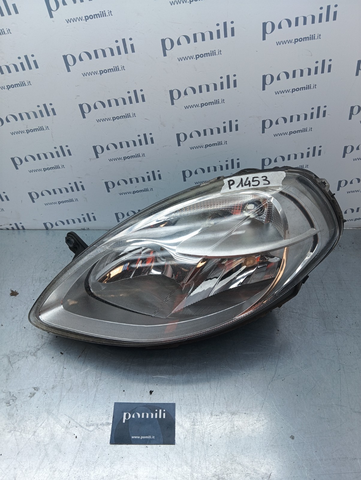 Pomili Fanaleria Lancia Y (1996-03) 153873-01 faro sinistro usato