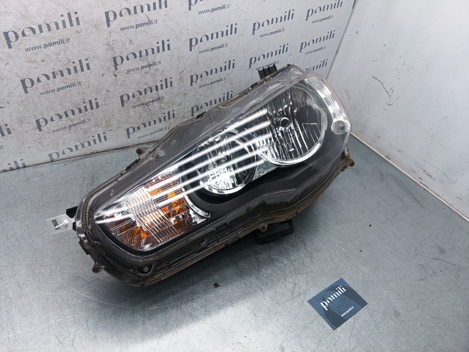 Pomili Fanaleria Lancer X faro anteriore sinistro EBM921-03 usato