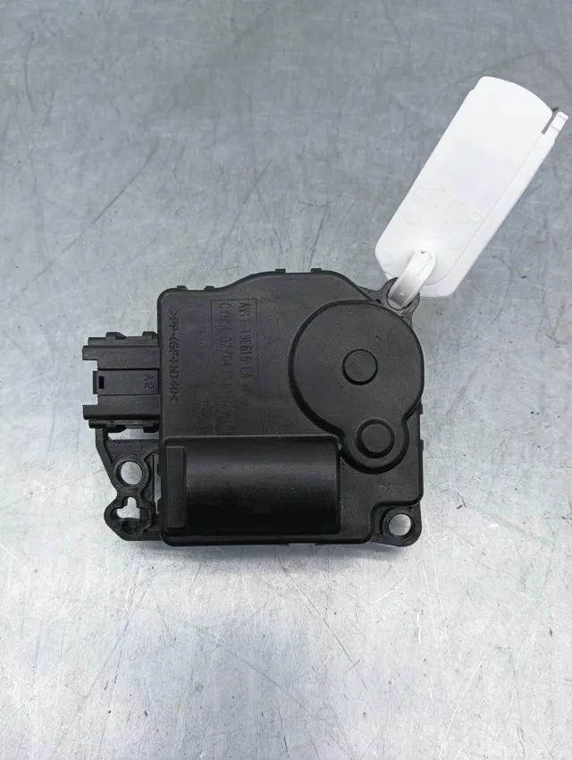Pomili Motore e cambio con supporti motorino attuatore clima AV11-19E616-GA usato