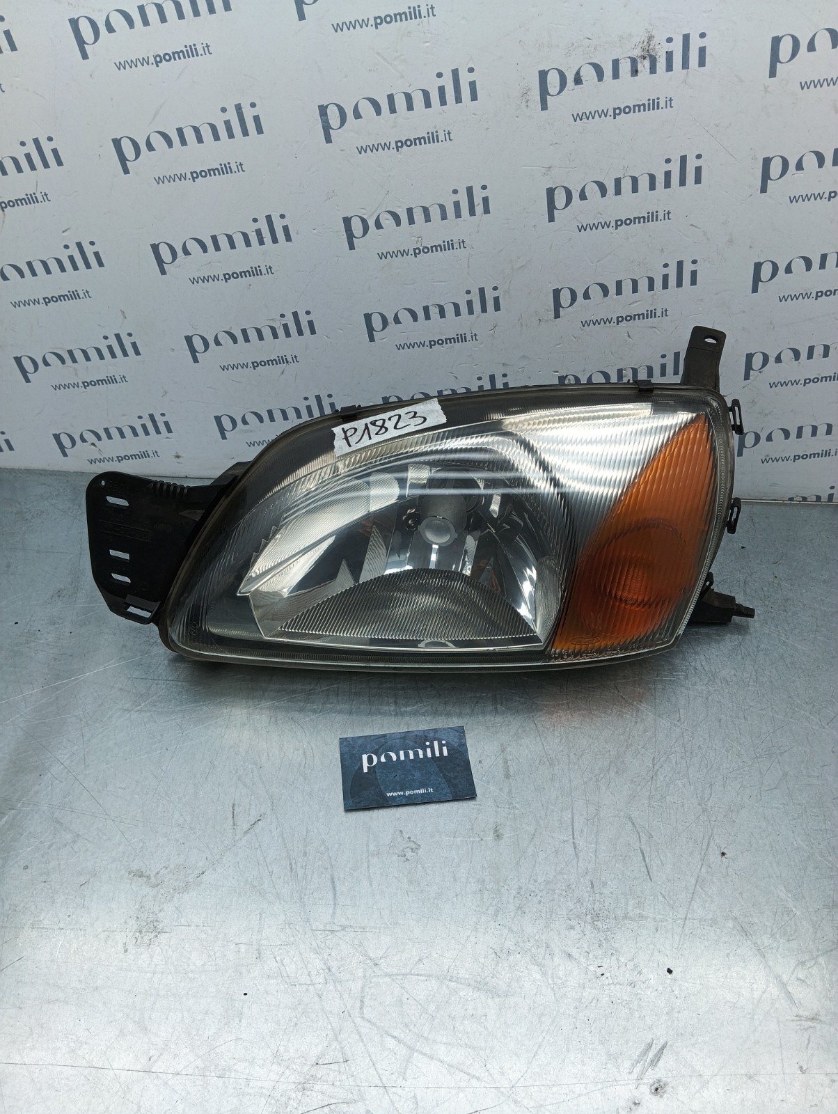 Pomili Fanaleria Ford Fiesta IV faro anteriore sinistro 1305235478 usato