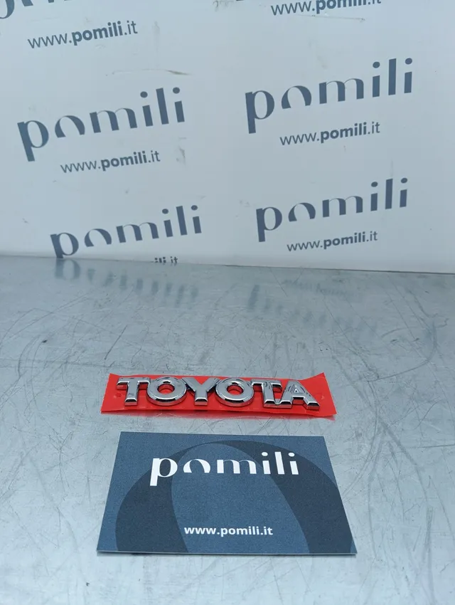 Pomili Lamierati esterni Targhetta scritta Toyota tutti i modelli 75446-0D010 emblema nuovo