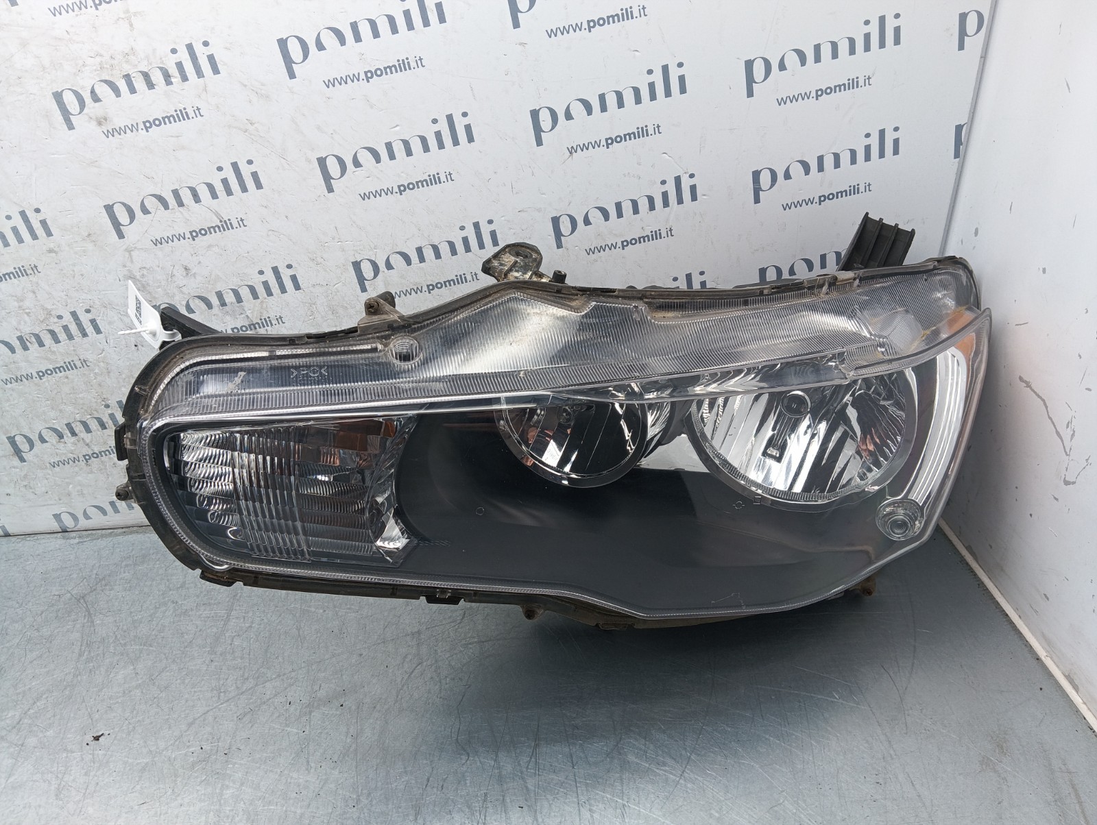 Pomili Fanaleria Lancer X faro anteriore sinistro EBM921-03 usato